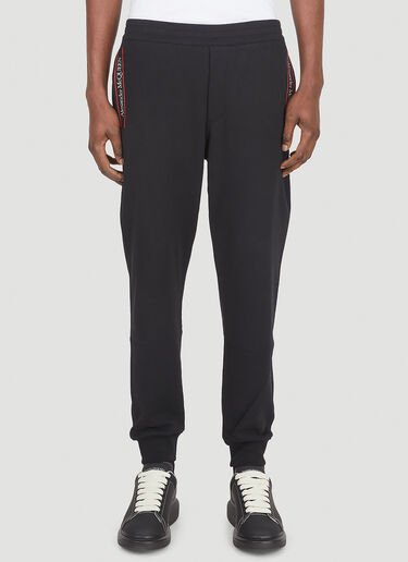 LN-CC® - Alexander McQueen: Logo Tape Track Pants - Black Alexander McQueen Logo Tape Track Pants Black amq0147017