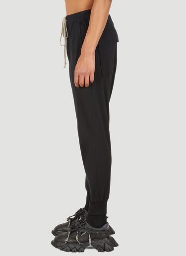 LN-CC® - Rick Owens x Champion: Prisoner Dropped Crotch Track Pants - Black Rick Owens x Champion Prisoner Dropped Crotch Track Pants Black roc0148016