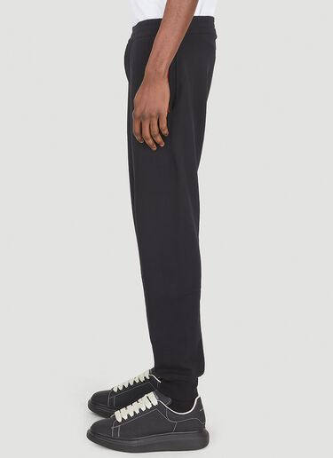 LN-CC® - Alexander McQueen: Logo Tape Track Pants - Black Alexander McQueen Logo Tape Track Pants Black amq0147017